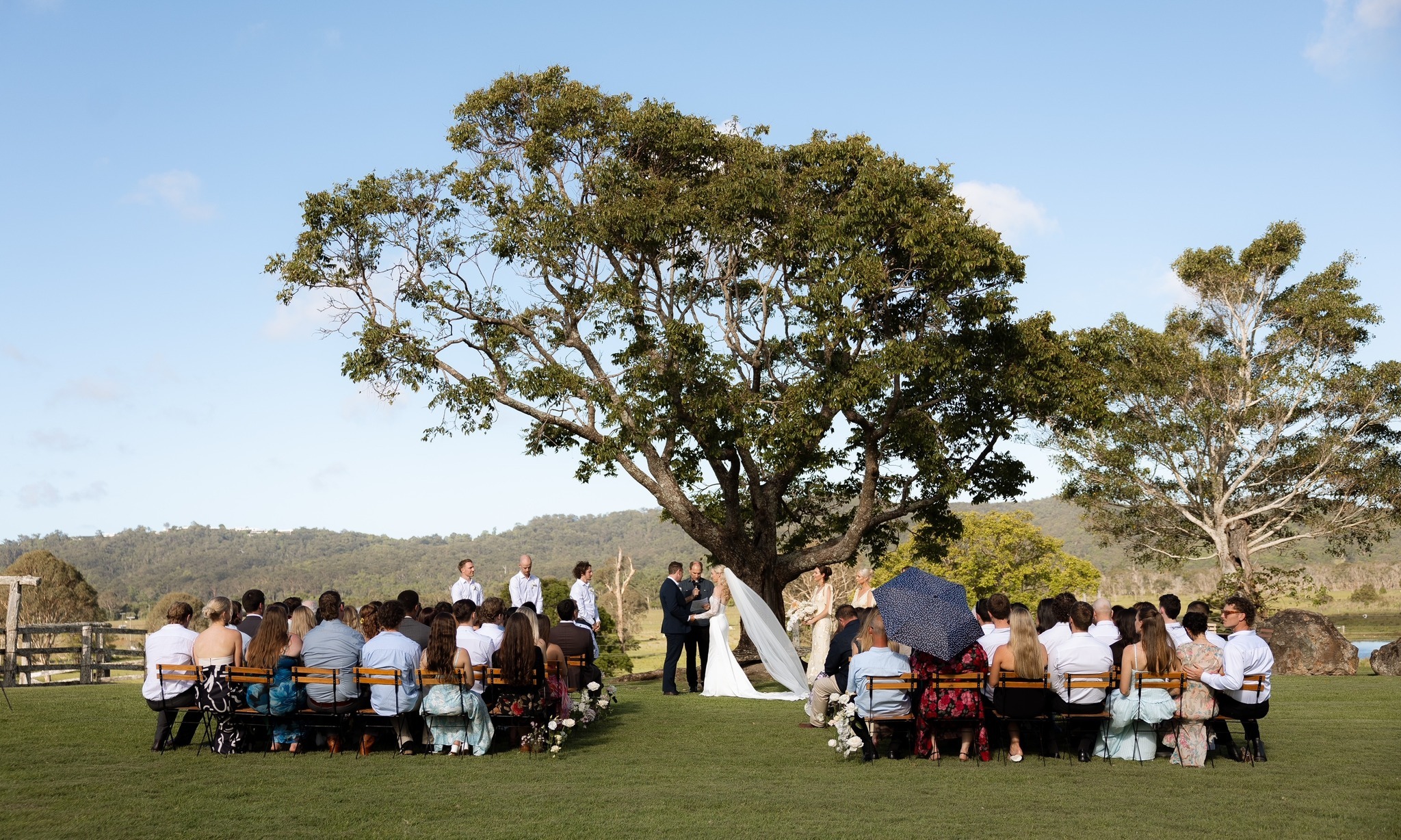 Outdoor wedding ceremony at a Sunshine Coast hinterland venue surrounded by nature