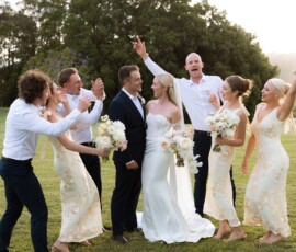 Wedding party celebrating outdoors at a Sunshine Coast hinterland wedding venue